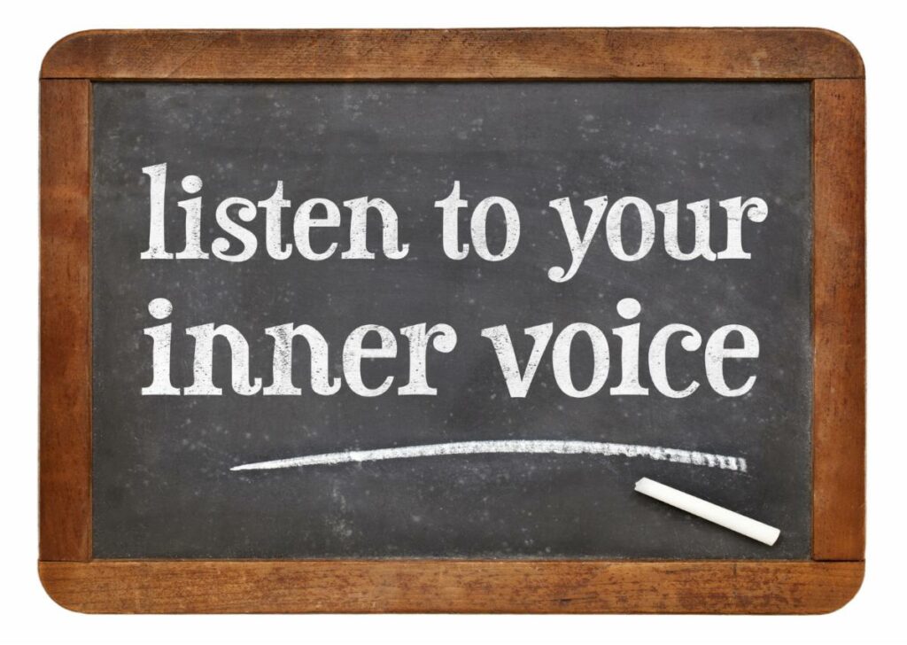 chalkboard with "listen to your inner voice" text